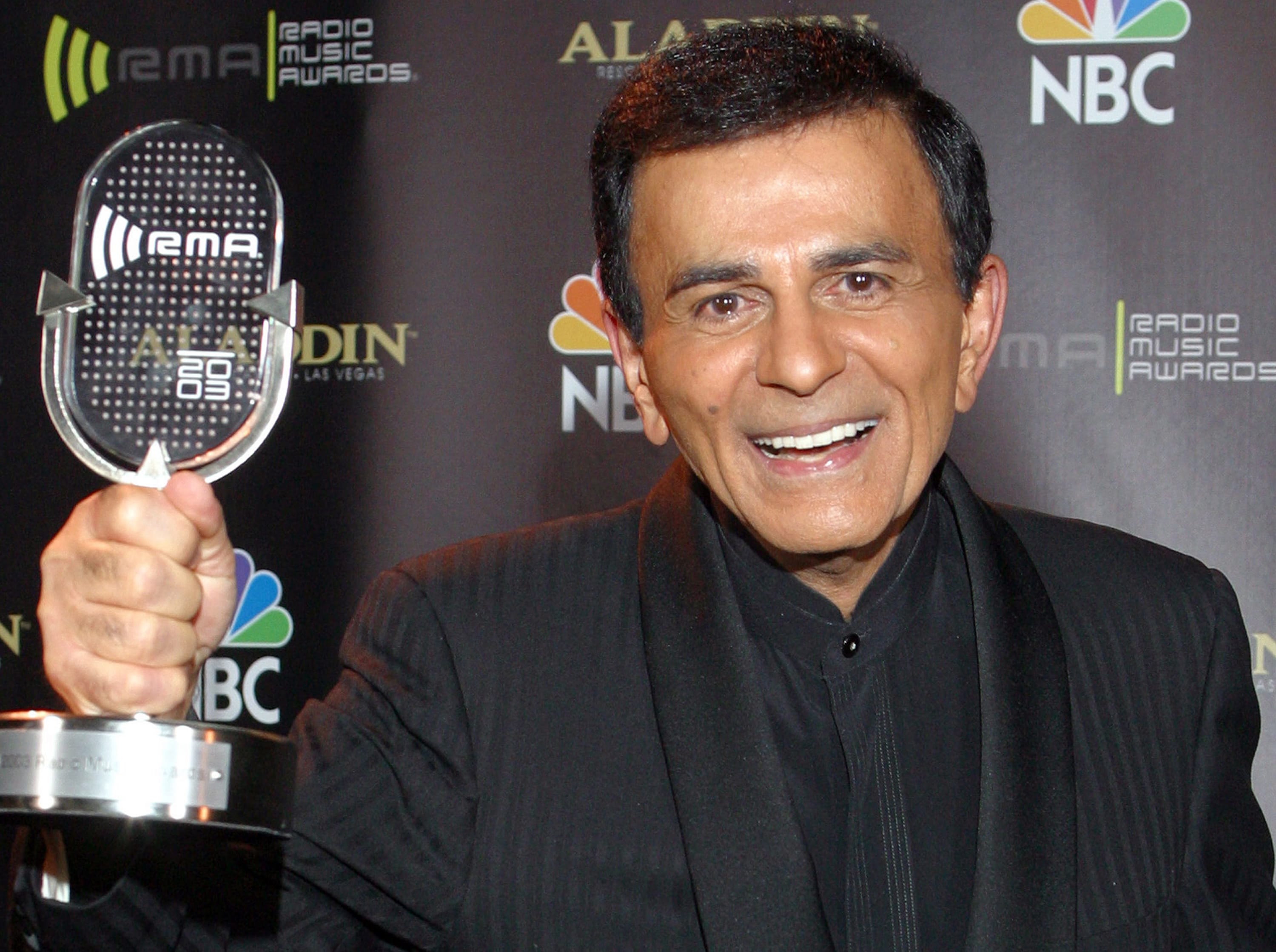 Casey Kasem poses for photographers after receiving the Radio Icon award during The 2003 Radio Music Awards in Las Vegas in 2003.