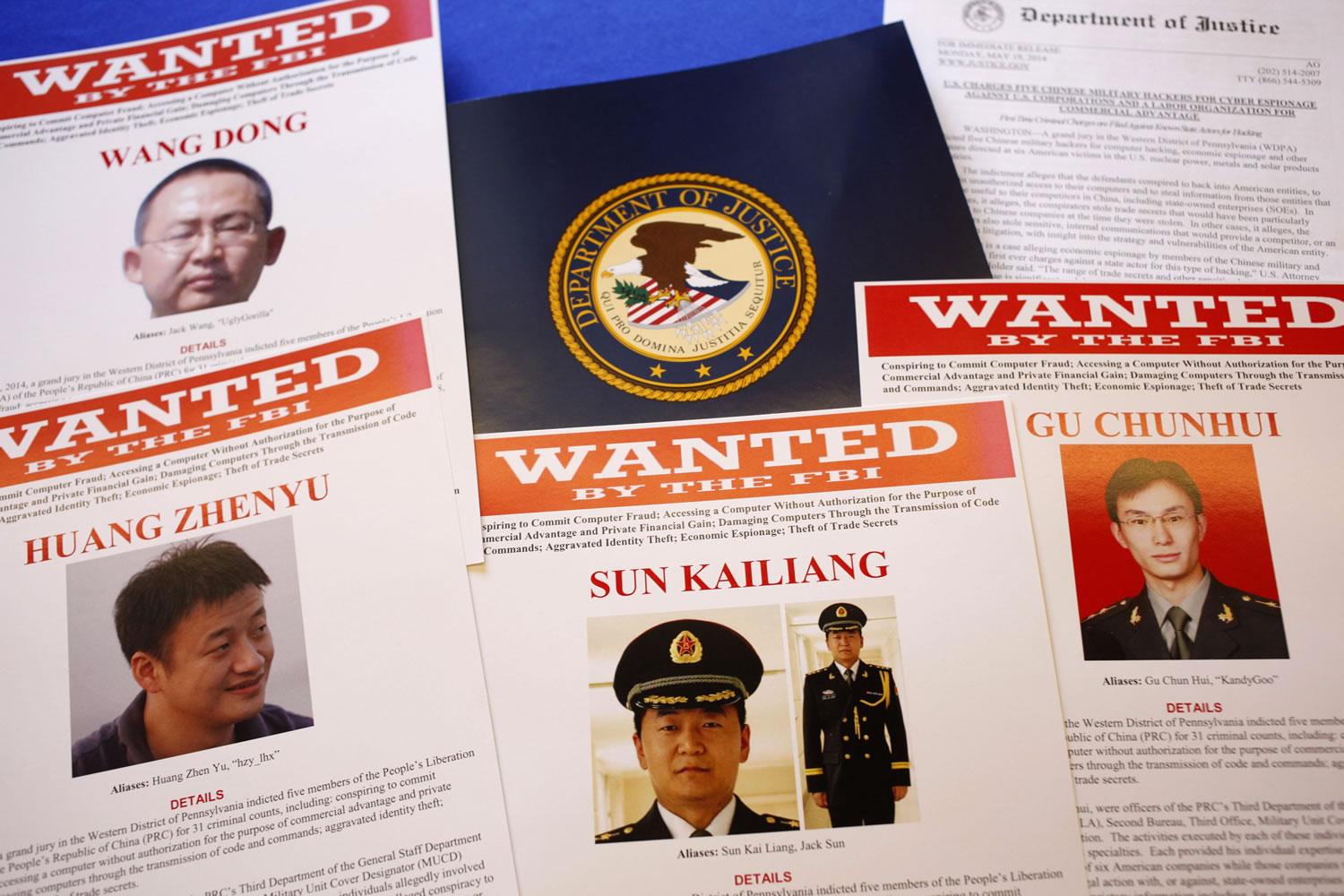 Press materials are displayed on a table of the Justice Department in Washington on Monday before Attorney General Eric Holder was to speak at a news conference.