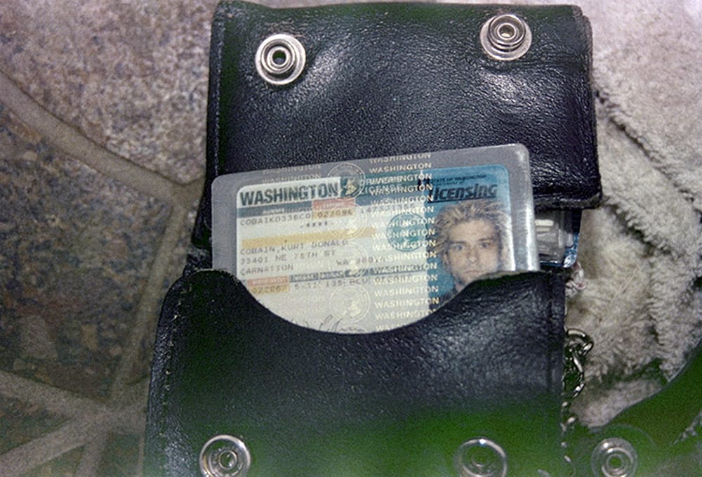 This April 1994 photo from the Seattle Police Department shows a wallet containing Kurt Cobain's Washington driver's license, found at the scene of his suicide, in Seattle. A handwritten note police discovered in Cobain's wallet disparages his wife, Courtney Love.