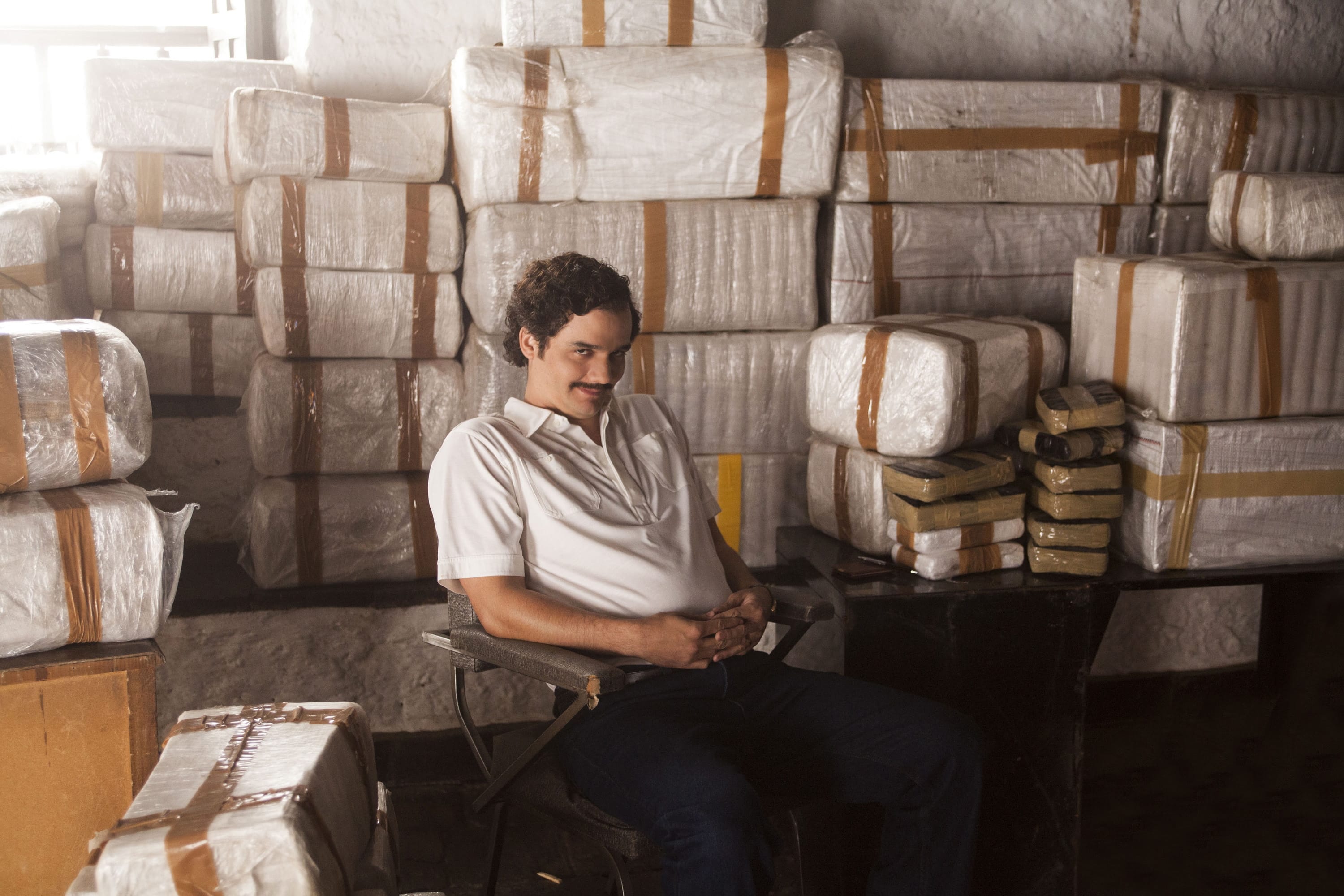 This undated production photo provided by Netflix shows, Wagner Moura as Pablo Escobar, in the Netflix Original Series &quot;Narcos.&quot; The biopic promises to be an authentic portrayal of Escobar, so it&iacute;s only natural that Brazilian director and executive producer Jose Padilha chose to film the 10-episode series in Medellin, the murder capital of the world during the drug kingpin&iacute;s heyday in the 1980s.