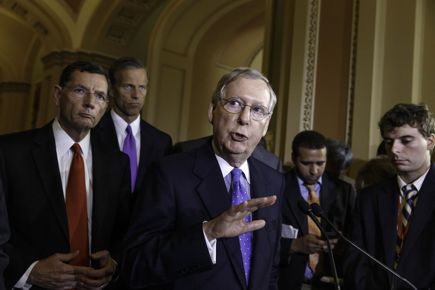 Senate Minority Leader Mitch McConnell of Ky., joined by, from left, Sen. John Barrasso, R-Wyo., and Sen.