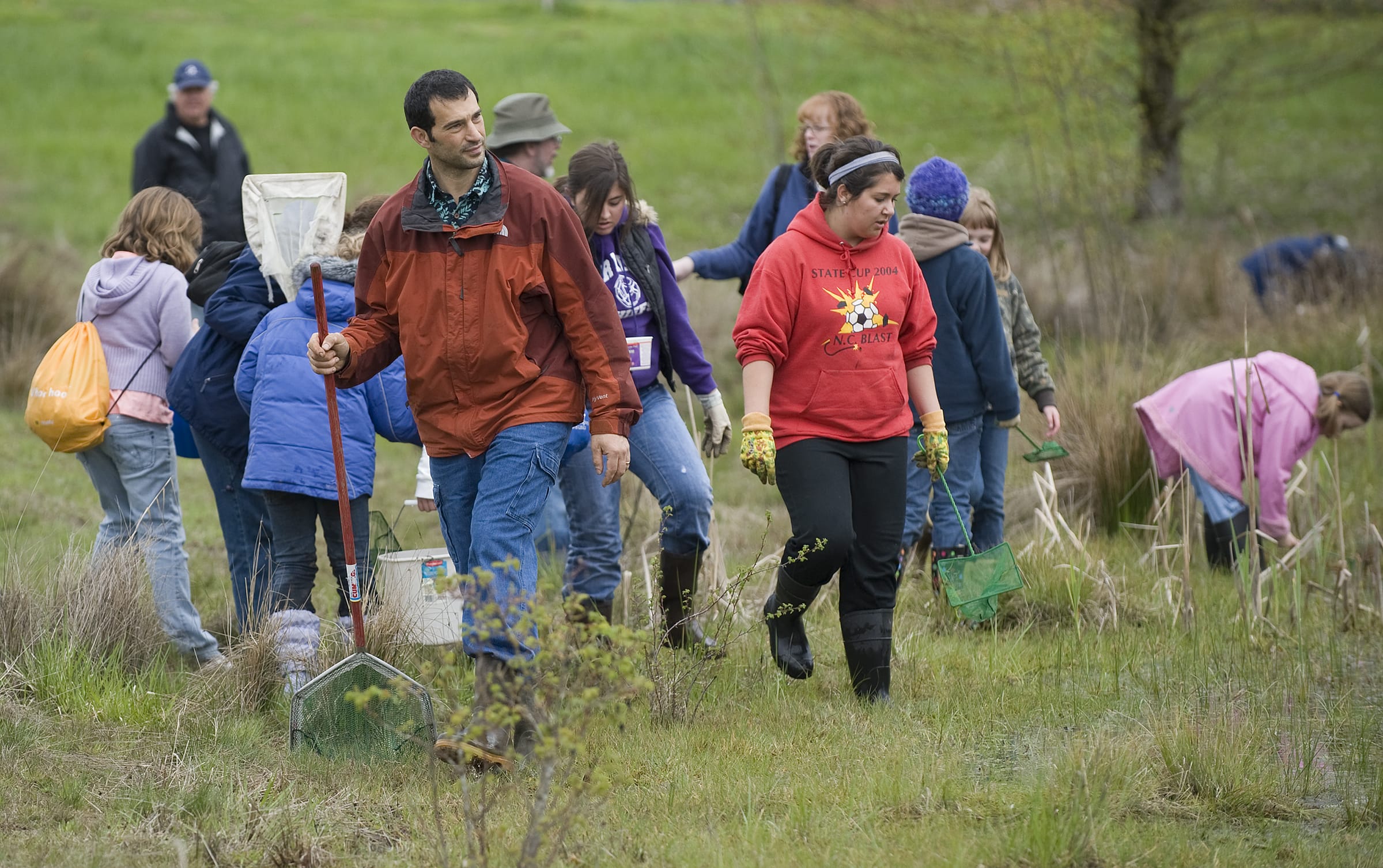 Peter Ritson, a chemistry instructor at Clark College, leads a group of amateur herpetologists through a wetland area of the Washington State University Vancouver campus during the 9th Annual Critter Count on April 11, 2009.
