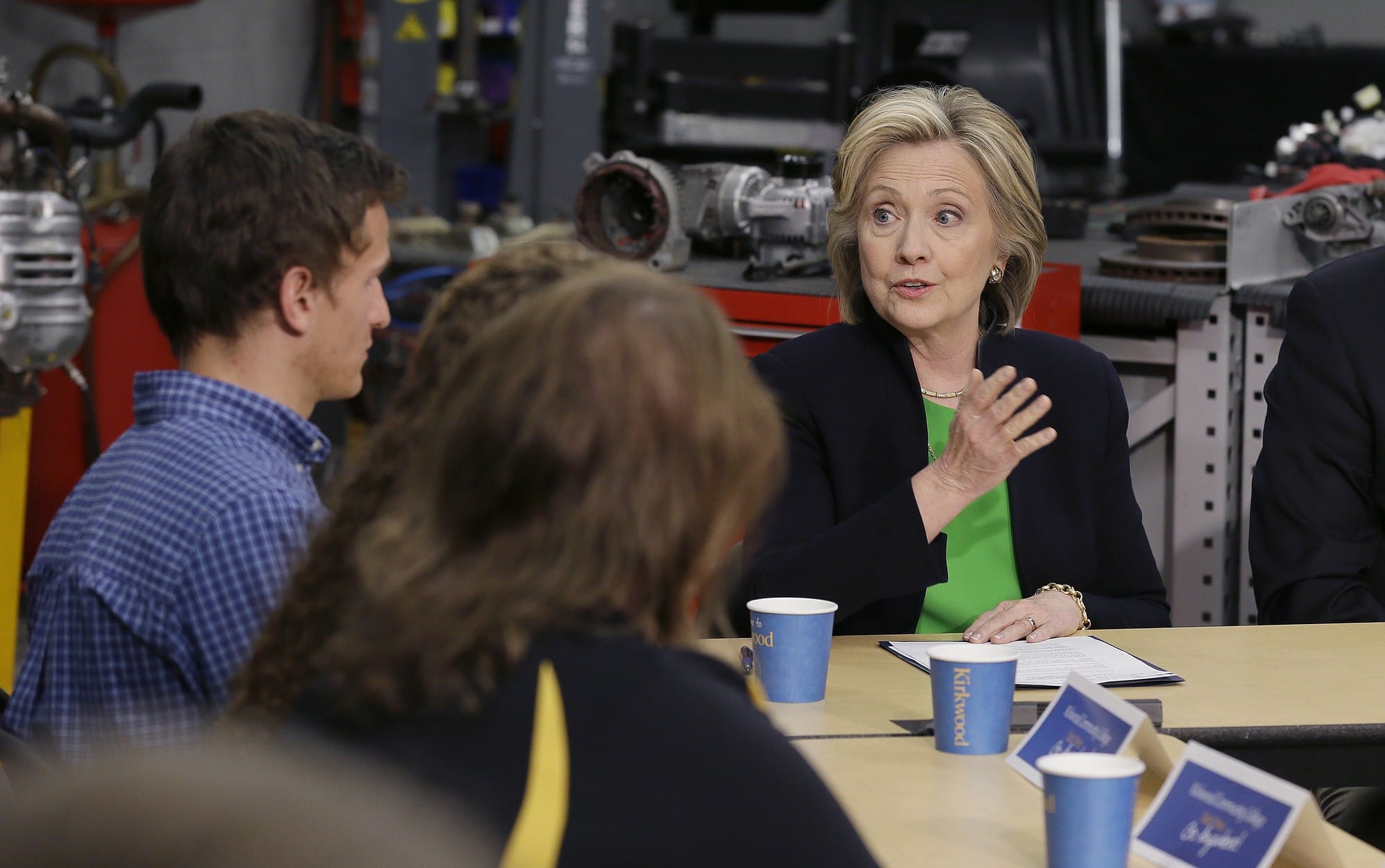 Presidential candidate Hillary Clinton, right, participates in a roundtable Tuesday at the Kirkwood Community College's Jones County Regional Center in Monticello, Iowa.