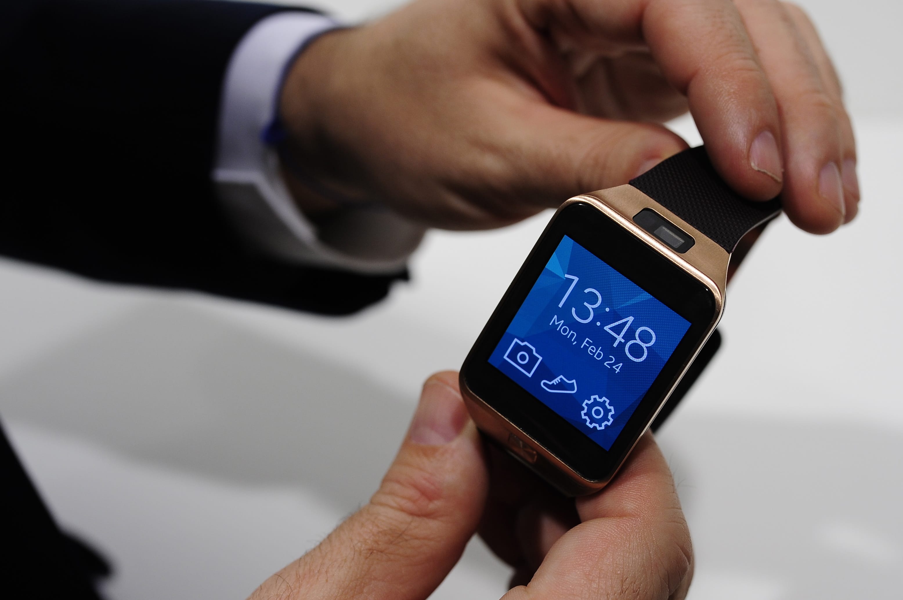 Samsung's latest gadgets, the Galaxy S5 smartphone, Gear Fit wristband and Gear 2 (shown) and Gear 2 Neo wristwatches, try to tap into people's passion for tracking fitness activities.