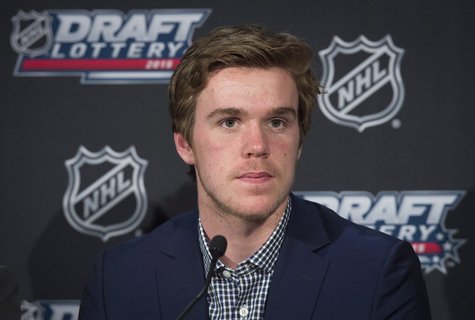 Connor McDavid speaks to reporters in Toronto on Saturday, April 18, 2015. The Edmonton Oilers have won the NHL draft lottery and the right to select Connor McDavid with the first pick in the draft.