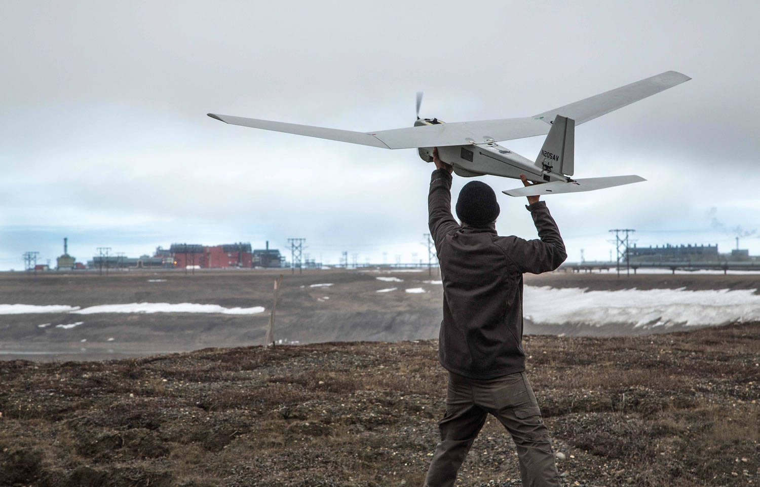 A Puma drone is given a pre-flight checkout in preparation for flights by BP at its Prudhoe Bay, Alaska.