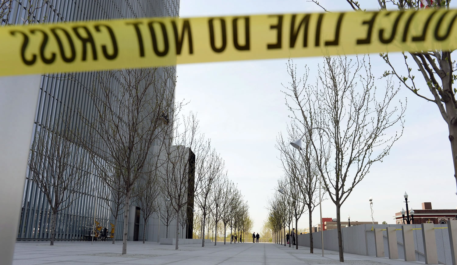 Authorities investigate a shooting inside the Federal Courthouse on Monday in Salt Lake City.