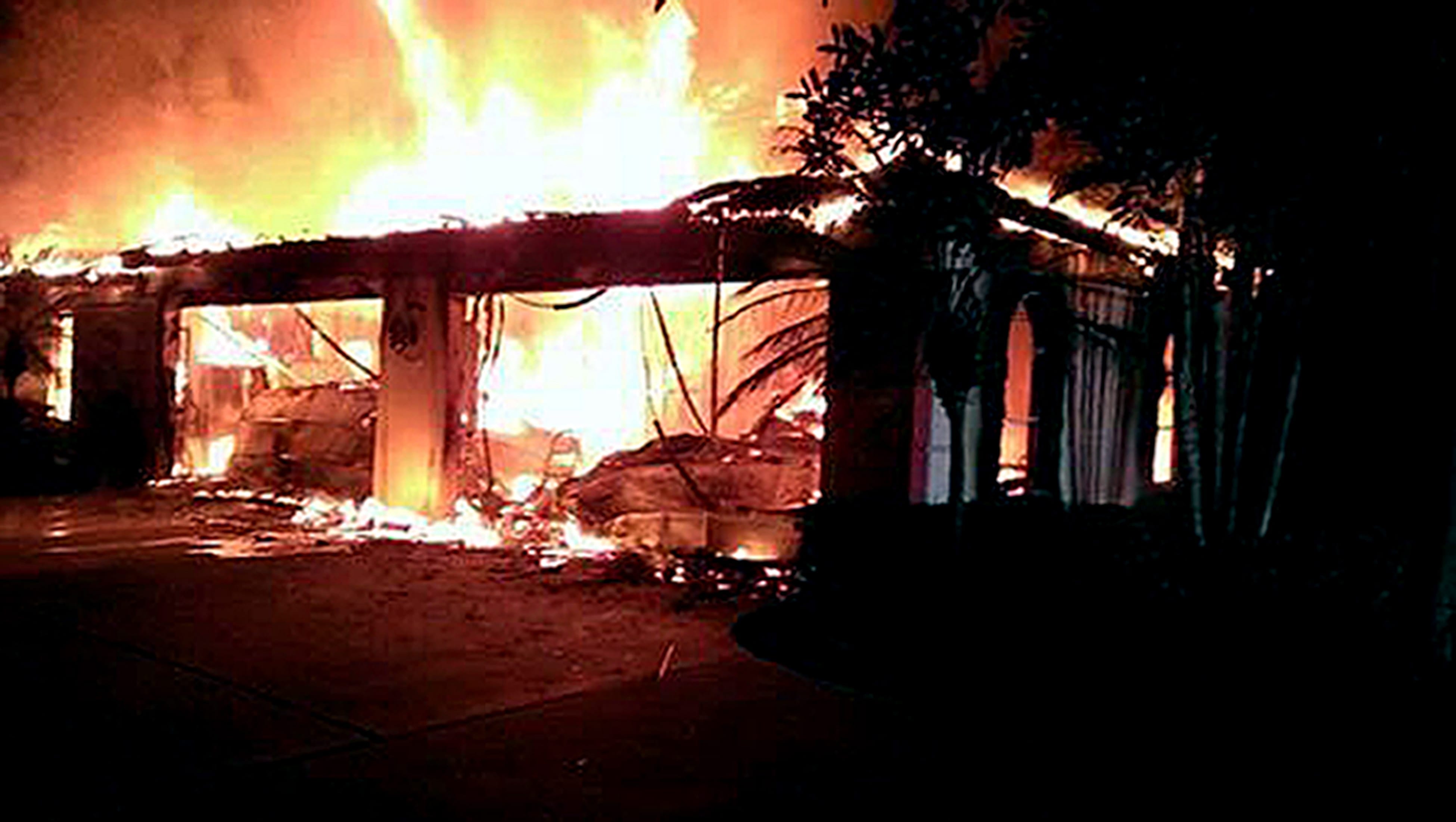 Flames destroy a mansion owned by former tennis star James Blake on Wednesday  in a gated community in Tampa, Fla.