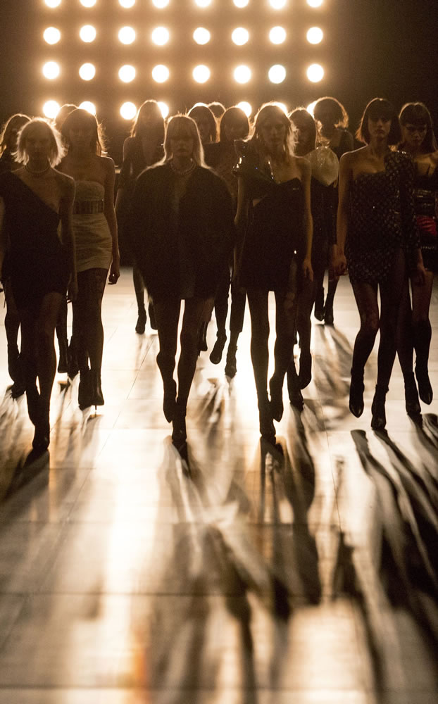 Associated Press files
Models wear creations for Saint Laurent's Fall/Winter 2015-2016 Ready to Wear fashion collection March 9 in Paris, as part of Paris Fashion Week. France's lower house of Parliament has approved April 3 a measure that would make it a crime to use anorexic models in advertising.