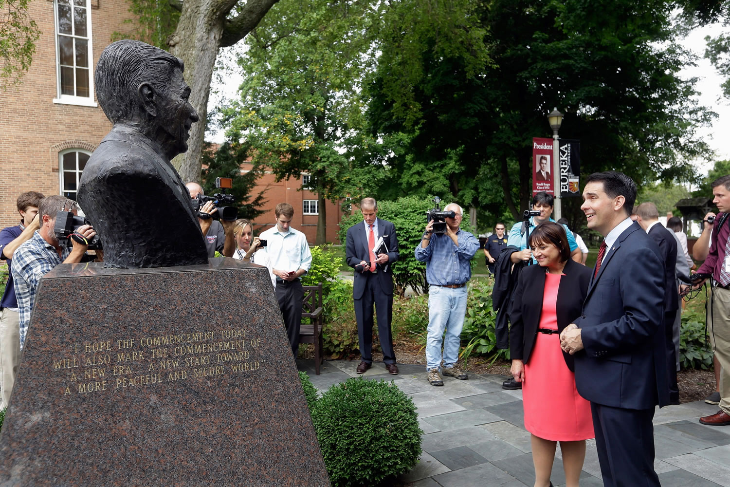 Republican presidential candidate, Wisconsin Gov. Scott Walker, right, and his wife Tonette, admire a bust of former president Ronald Reagan, in the Ronald Reagan Peace Garden, after speaking at Eureka College during a campaign stop, Thursday, Sept. 10, 2015, in Eureka, Ill.
