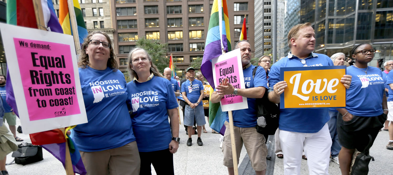 Supporters of gay marriage in Wisconsin and Indiana attend a rally at the federal plaza Monday in Chicago. The Chicago-based 7th U.S. Circuit Court of Appeals will hear arguments Tuesday on gay marriage fights from Indiana and Wisconsin, setting the stage for one ruling.