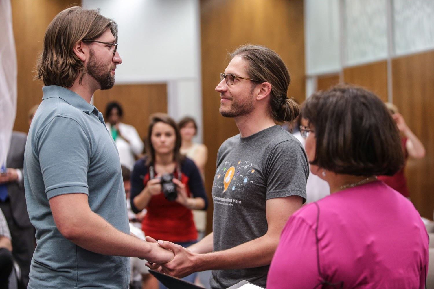 Craig Bowen, 35, left, and Jake Miller, 30, are married by Marion County Clerk Beth White, right, in Indianapolis on Wednesday.