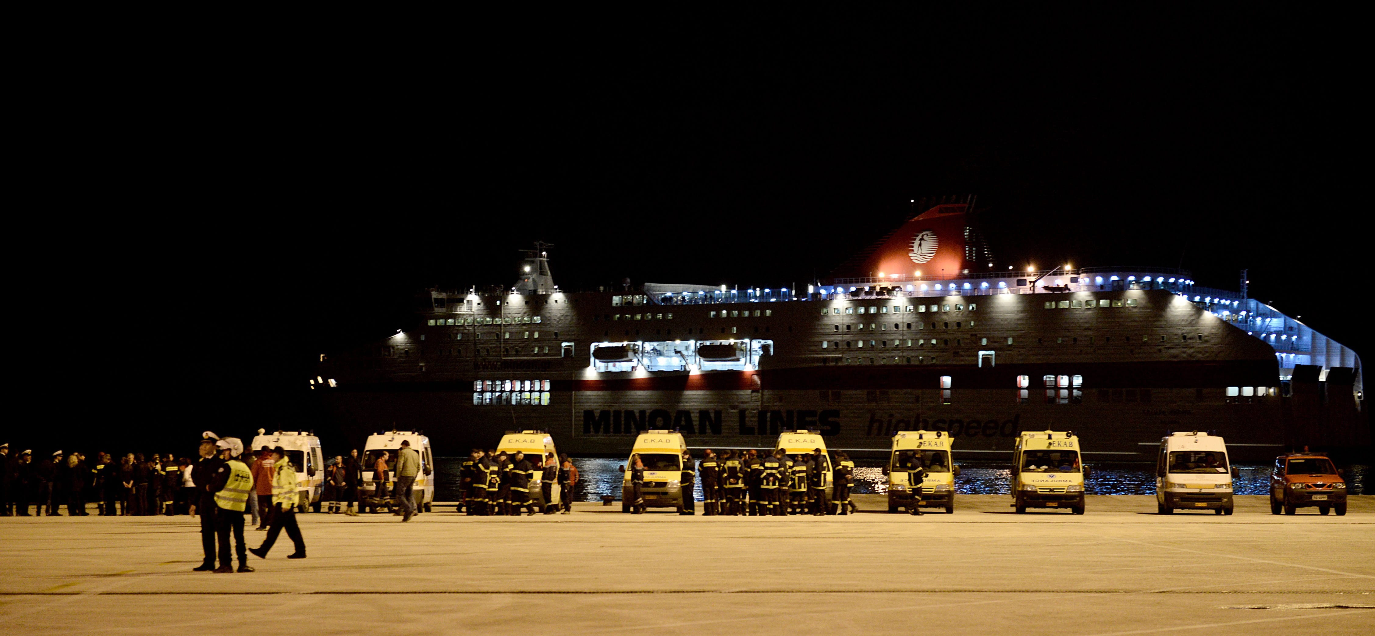 Ambulances are parked on the dock as Cruise Europa ferry arrives at Igoumenitsa port, northwestern Greece, carry rescued passengers from the fire-struck ferry Norman Atlantic, on Monday.