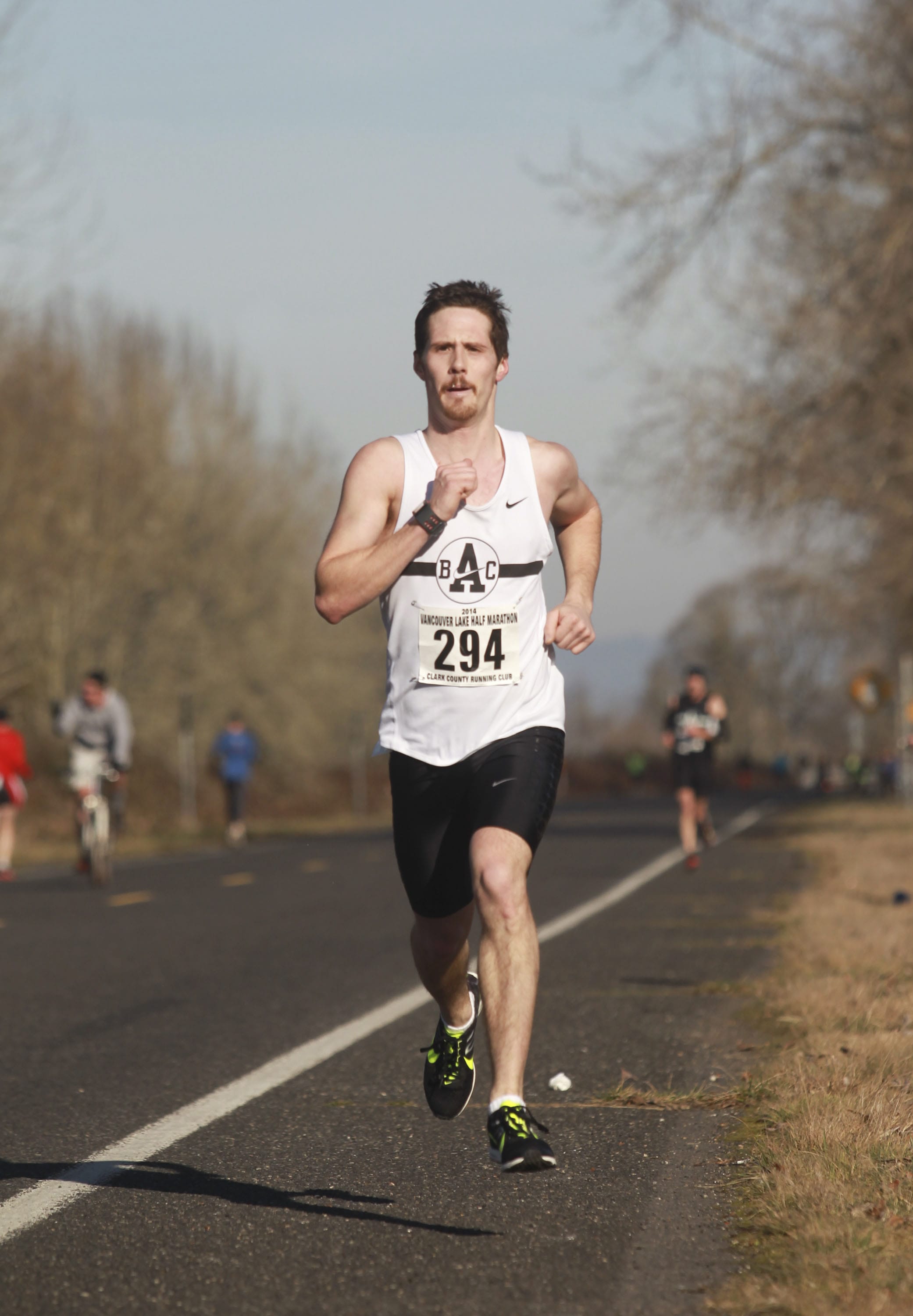Jesse McChesney, who took first place, runs in annual Vancouver Lake Half Marathon on Sunday.
