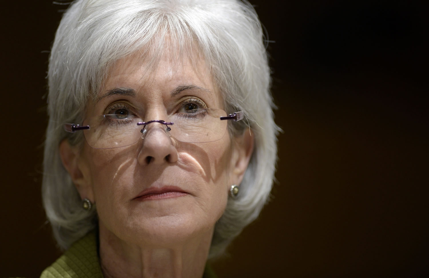 Health and Human Services Secretary Kathleen Sebelius listens Thursday during her appearance at the Senate Finance Committee hearing on her department's 2015 budget.