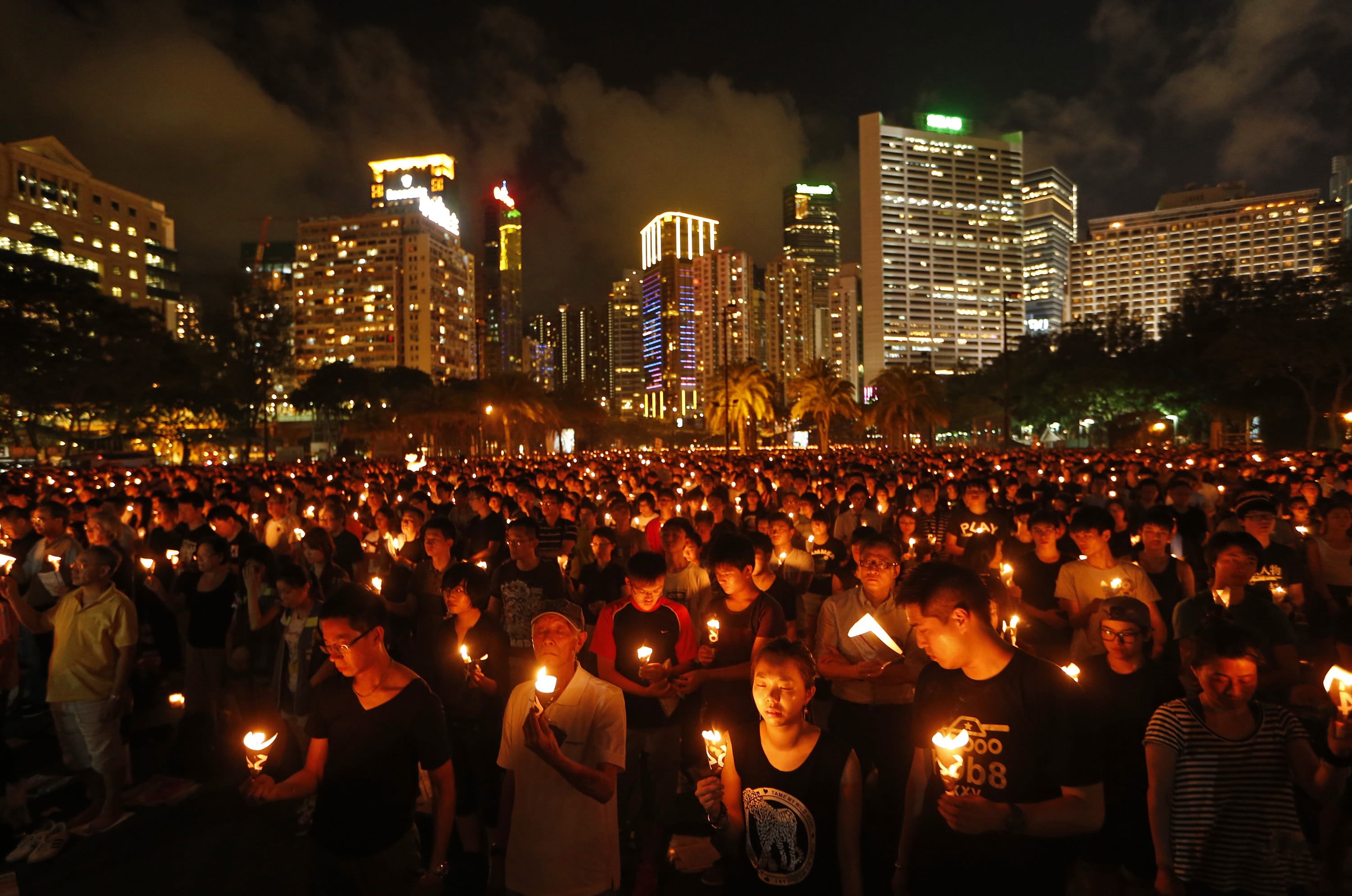 Thousands of people attend a candlelight vigil at Victoria Park in Hong Kong on Wednesday to mark the  anniversary of the June 4, 1989, military crackdown on the pro-democracy movement in Beijing.