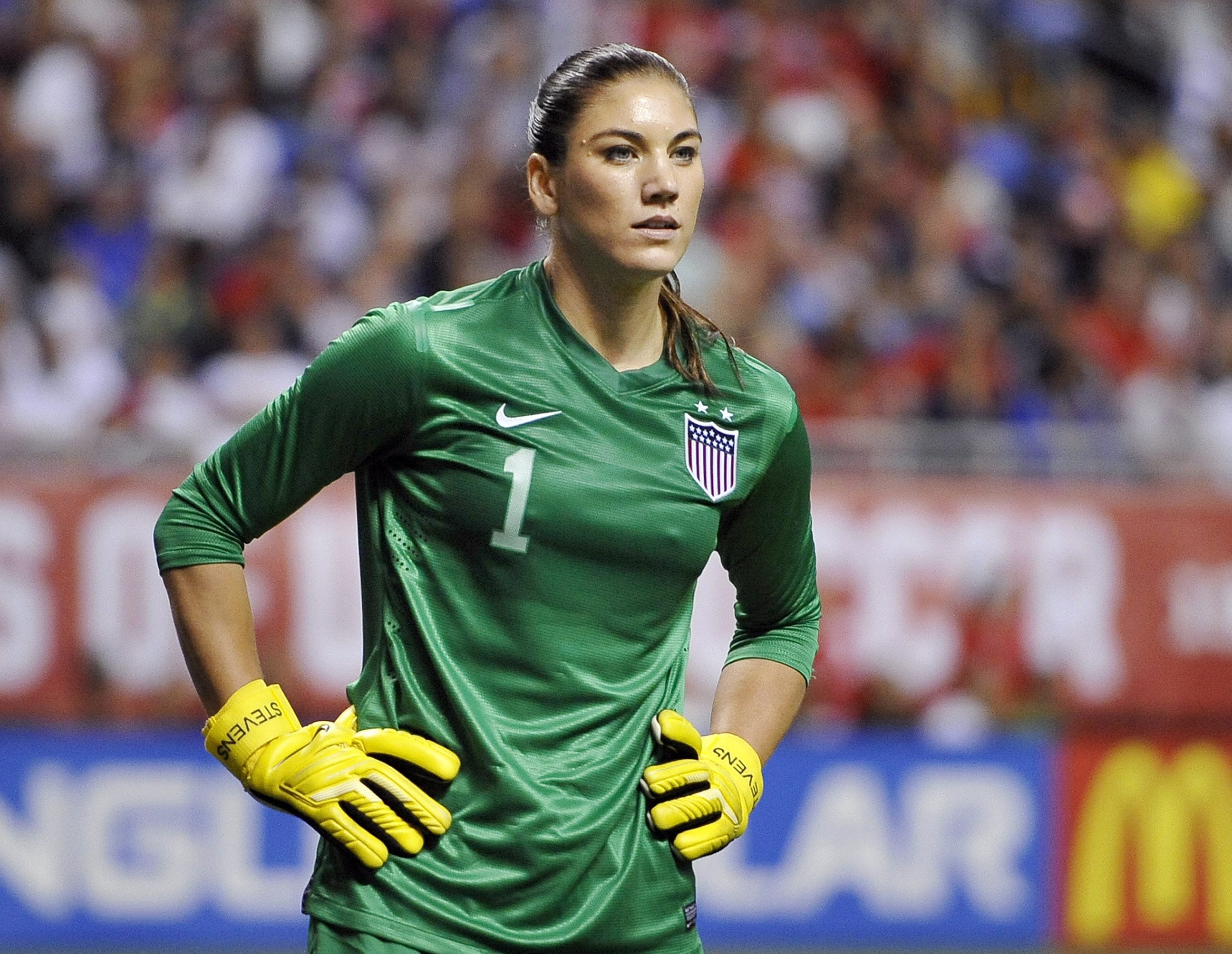 United States goalkeeper Hope Solo pauses on the field during the second half of an international friendly womenu2019s soccer match against Australia on Oct. 20, 2013, in San Antonio.
