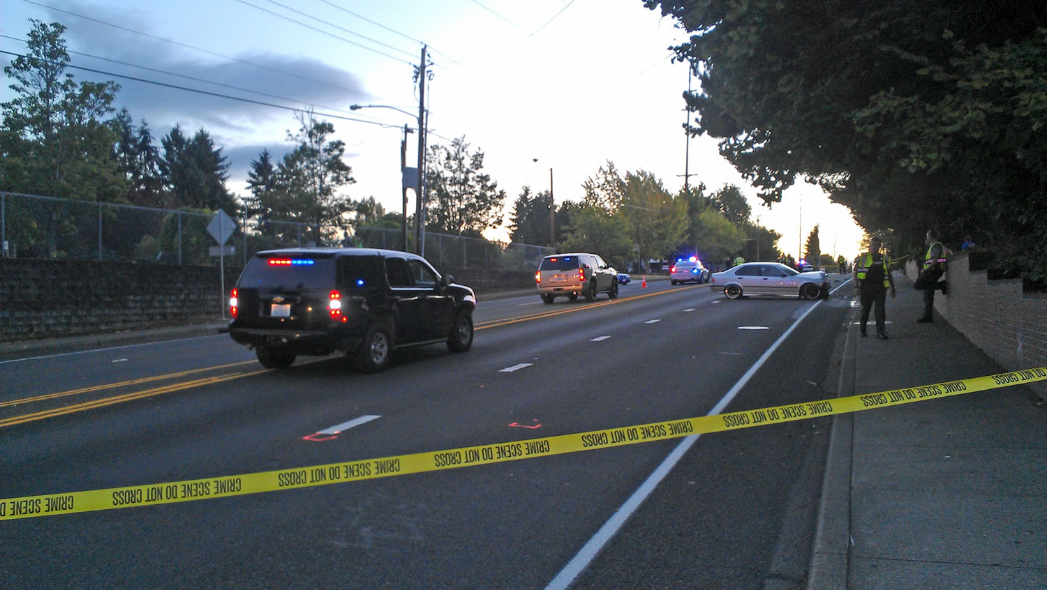 Clark County sheriff's deputies respond to the scene of a two-car crash that critically injured a teenage pedestrian Sunday evening on Northwest 99th Street just west of Columbia River High School.