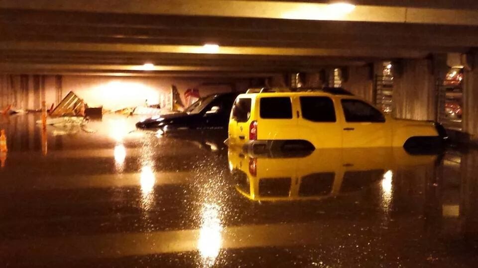 Water floods parts of a parking garage at PeaceHealth Southwest Medical Center in Vancouver on Wednesday evening.