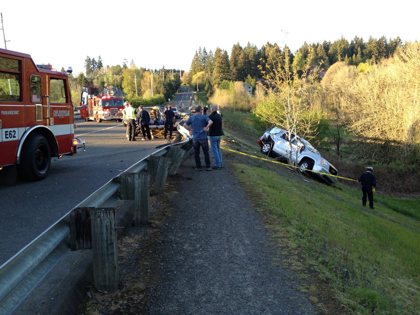 A vehicle crash on Sunday in Felida sent this SUV over a guardrail and caused the SUV to roll once before it landed on its wheels near the Salmon Creek Trail.