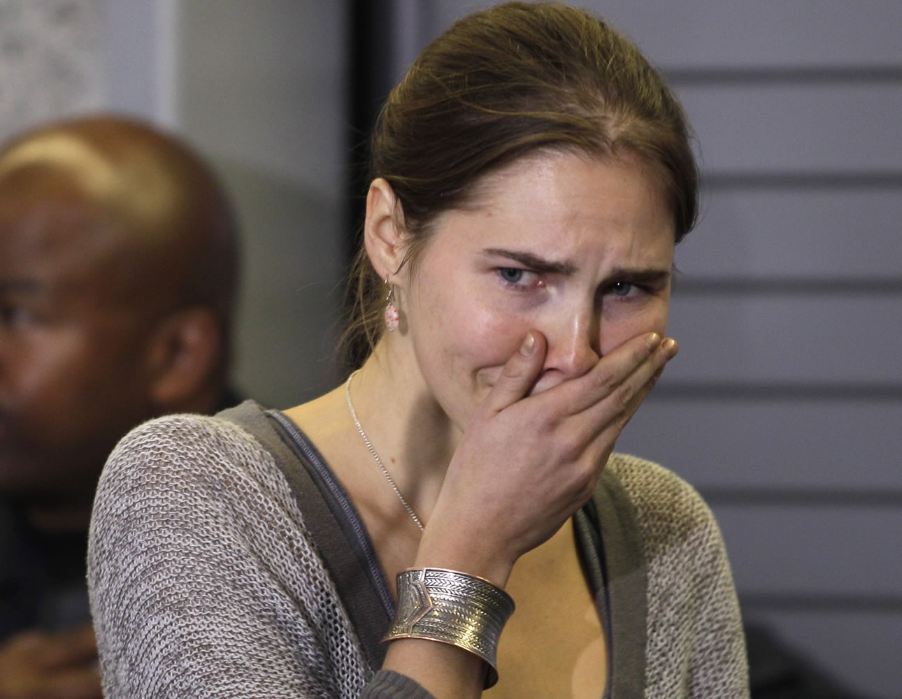 Amanda Knox gestures during a press conference Oct.