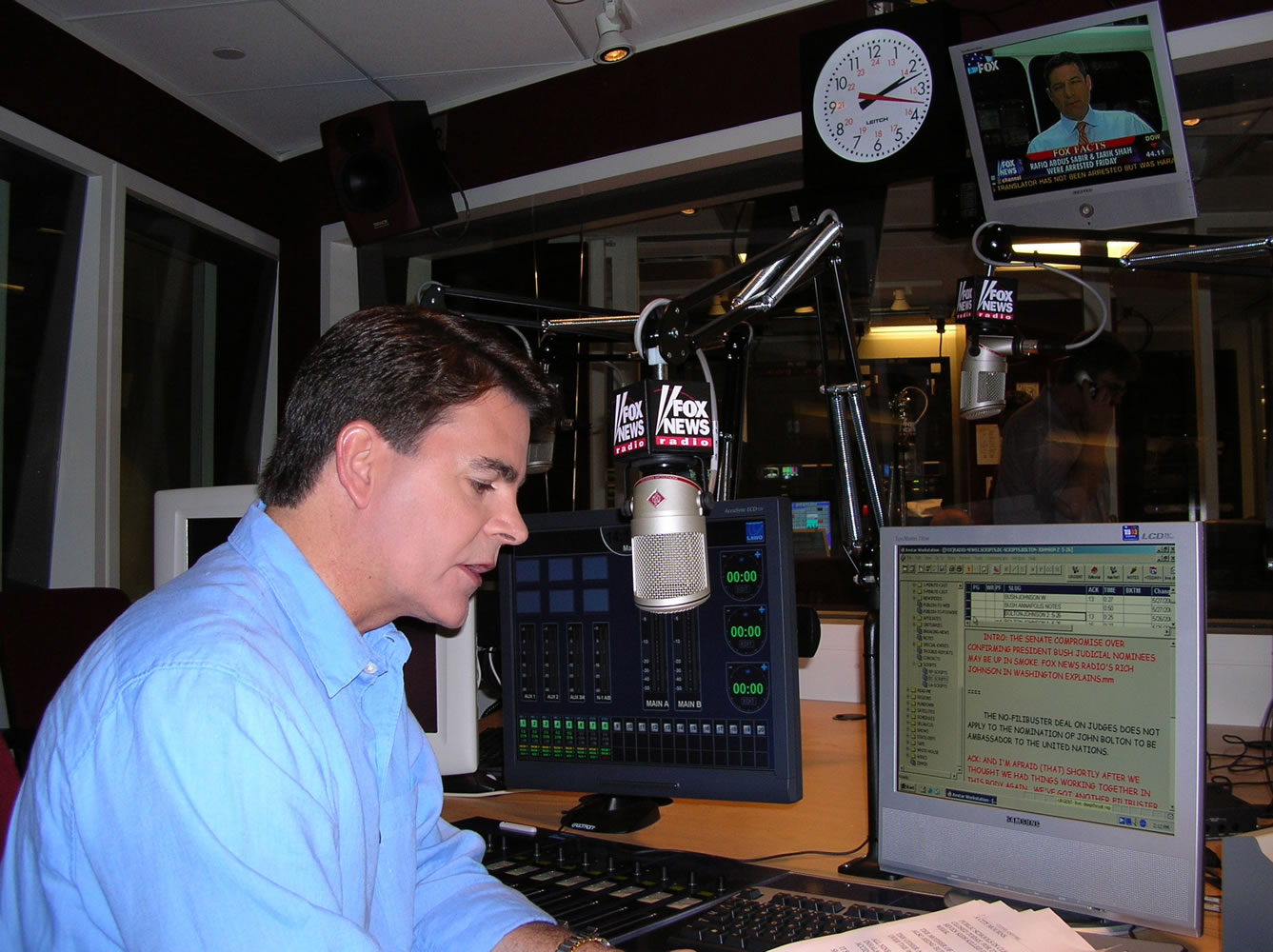 Fox News shows anchor Gregg Jarrett rehearses on May 31, 2005, in New York, for the debut of Fox News Radio's five-minute newscast.