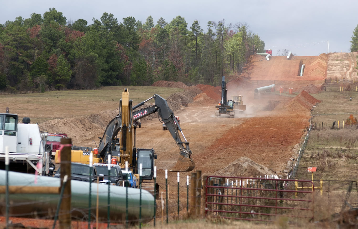 Crews work on construction of the TransCanada Keystone XL Pipeline near County Road 363 and County Road 357, east of Winona, Texas, on Dec. 3, 2012. In a move that disappointed environmental groups and cheered the oil industry, the Obama administration on Jan.