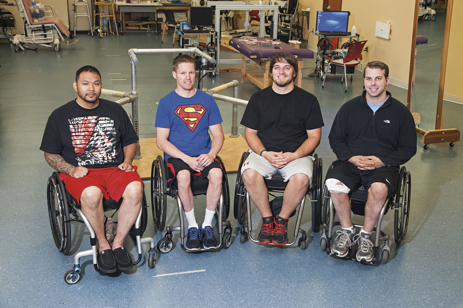 Andrew Meas, from left, Dustin Shillcox, Kent Stephenson and Rob Summers are the first four to undergo task-specific training with epidural stimulation at the Human Locomotion Research Center laboratory, Frazier Rehab Institute, as part of the University of Louisville's Kentucky Spinal Cord Injury Research Center in Louisville Ky.