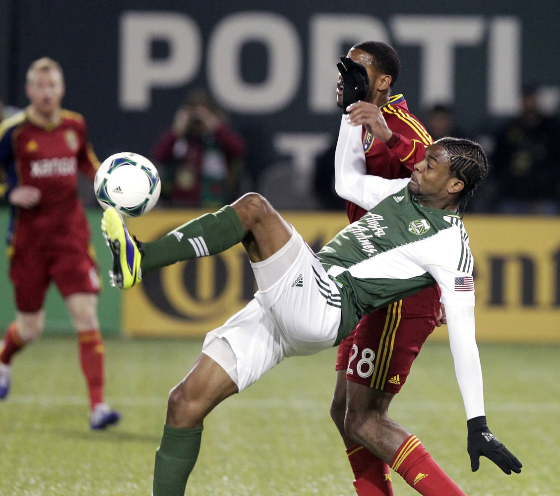 Portland Timbers forward Frederic Piquionne right, battles for the ball in last season's Western Conference finals.