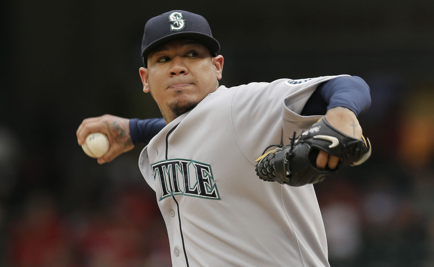 Felix Hernandez gave up two runs, struck out five and matched a season high with five walks against the Texas Rangers in Arlington, Texas, on Sunday, Sept. 20, 2015.