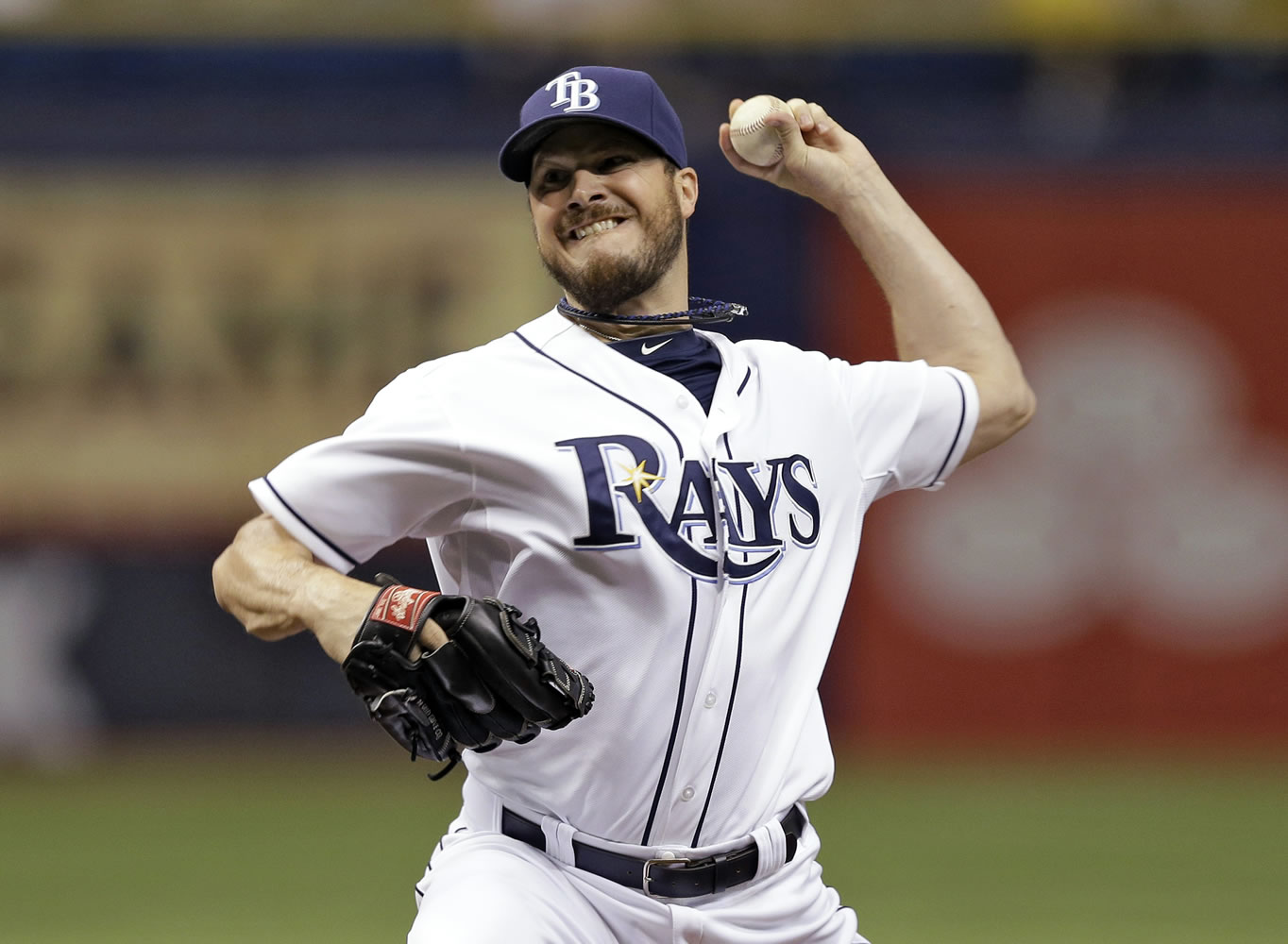 Tampa Bay Rays starting pitcher Erik Bedard delivers to the Seattle Mariners during the first inning of a baseball game Friday, June 6, 2014, in St. Petersburg, Fla.