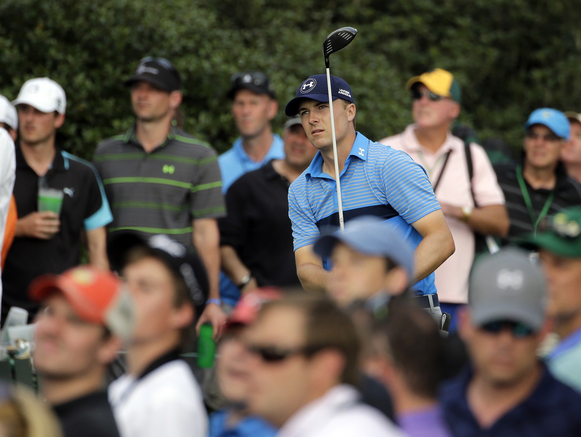 Jordan Spieth watches his tee shot on the 15th hole during the first round of the Masters golf tournament Thursday, April 9, 2015, in Augusta, Ga.