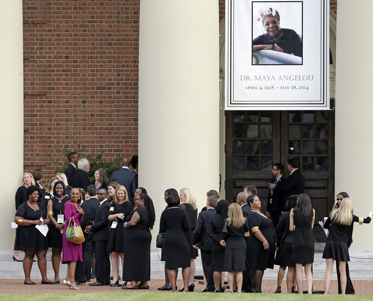 Mourners wait outside Wait Chapel before a memorial service for poet and author Maya Angelou at Wait Chapel at Wake Forest University in Winston-Salem, N.C., on Saturday.