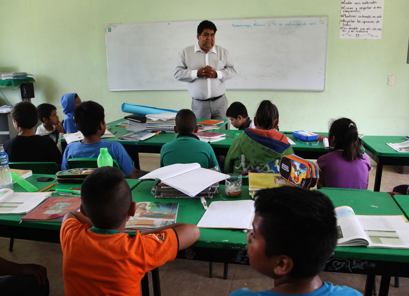 Cuitlahuac Mondragon, the uncle of slain college student Julio Cesar Mondragon, teaches at an elementary school Sept. 15 in San Miguel Tecomatlan, a rural town in the hills of Mexico state.