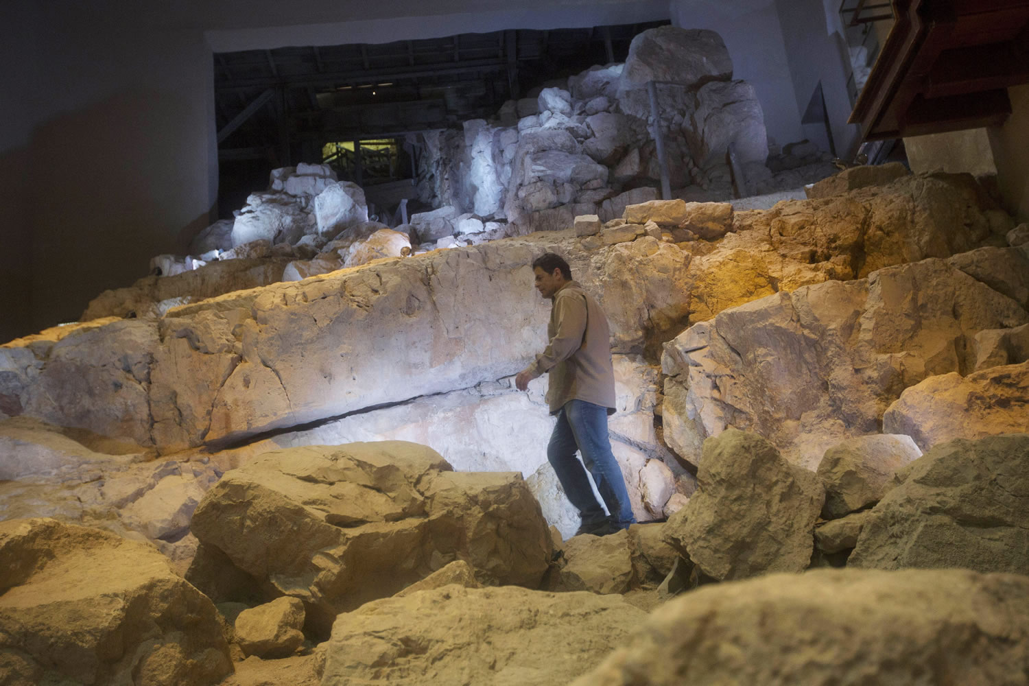 Eli Shukron, an archeologist formerly with Israel's Antiquities Authority, walks in the City of David archaeological site near Jerusalem's Old City.