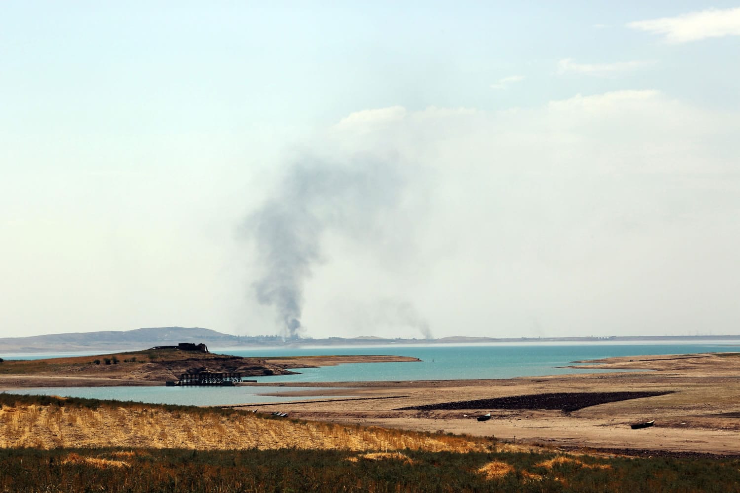 Smoke rises during airstrikes targeting Islamic State militants at the Mosul Dam outside Mosul, Iraq, on Monday.