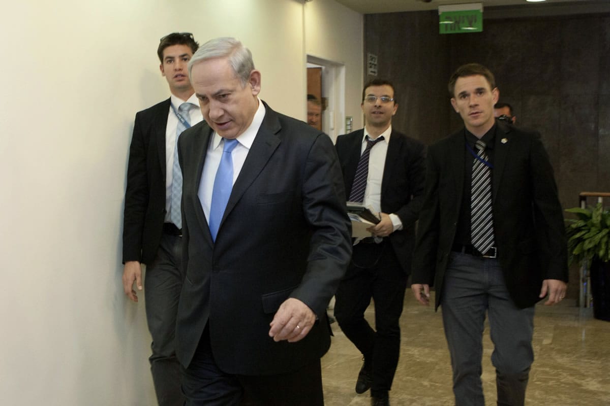 Israeli Prime Minister Benjamin Netanyahu arrives to a weekly cabinet meeting at his office in Jerusalem on Wednesday.