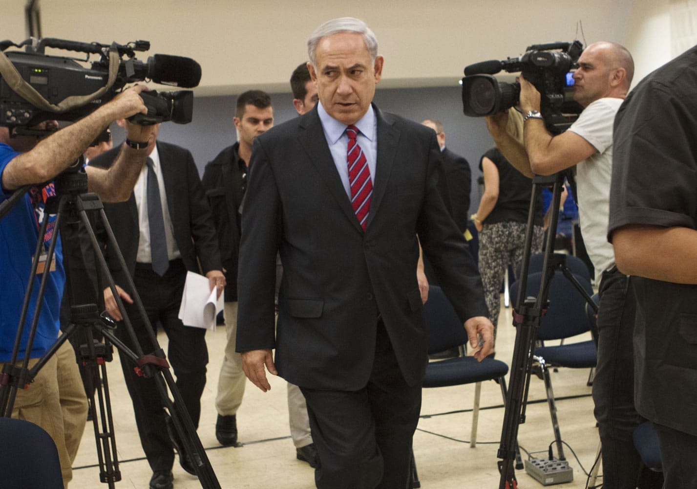 Israeli Prime Minister Benjamin Netanyahu leaves a press conference in Tel Aviv, Israel, on Sunday.