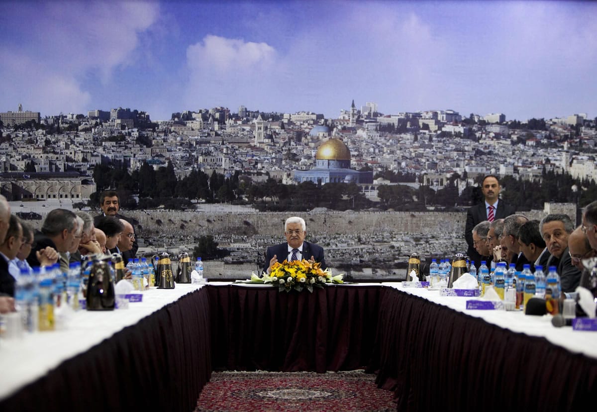Palestinian President Mahmoud Abbas talks during a leadership meeting in Ramallah.