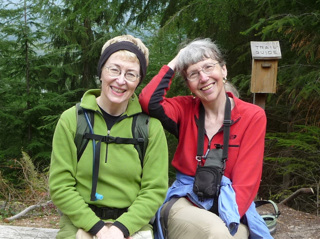 Missing hiker Karen Sykes, right, with her friend Lola Kemp. Crews searched Mount Rainier National Park on Friday for Sykes, a prominent hiker and outdoors writer who was reported missing late Wednesday.