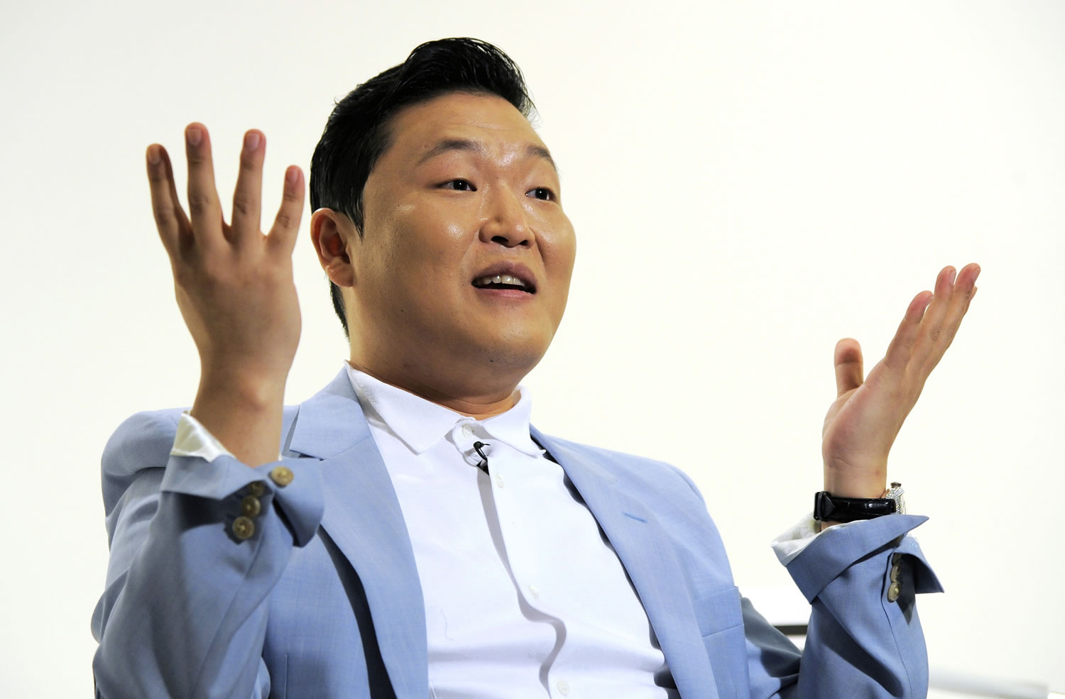 The ubiquitous 2012 hit is one South Korean singer Psy knows he probably will never top, and that makes creating new music quite a challenge.