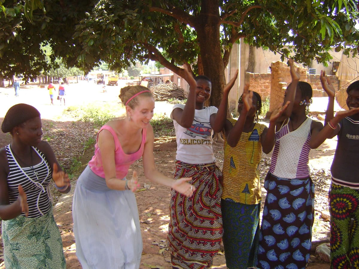 West Hazel Dell: Vancouver's Royce Andrews, second from left, shares a moment with young women in Burkina Faso, West Africa, during her two-year service in the Peace Corps, which she wrapped up this year.