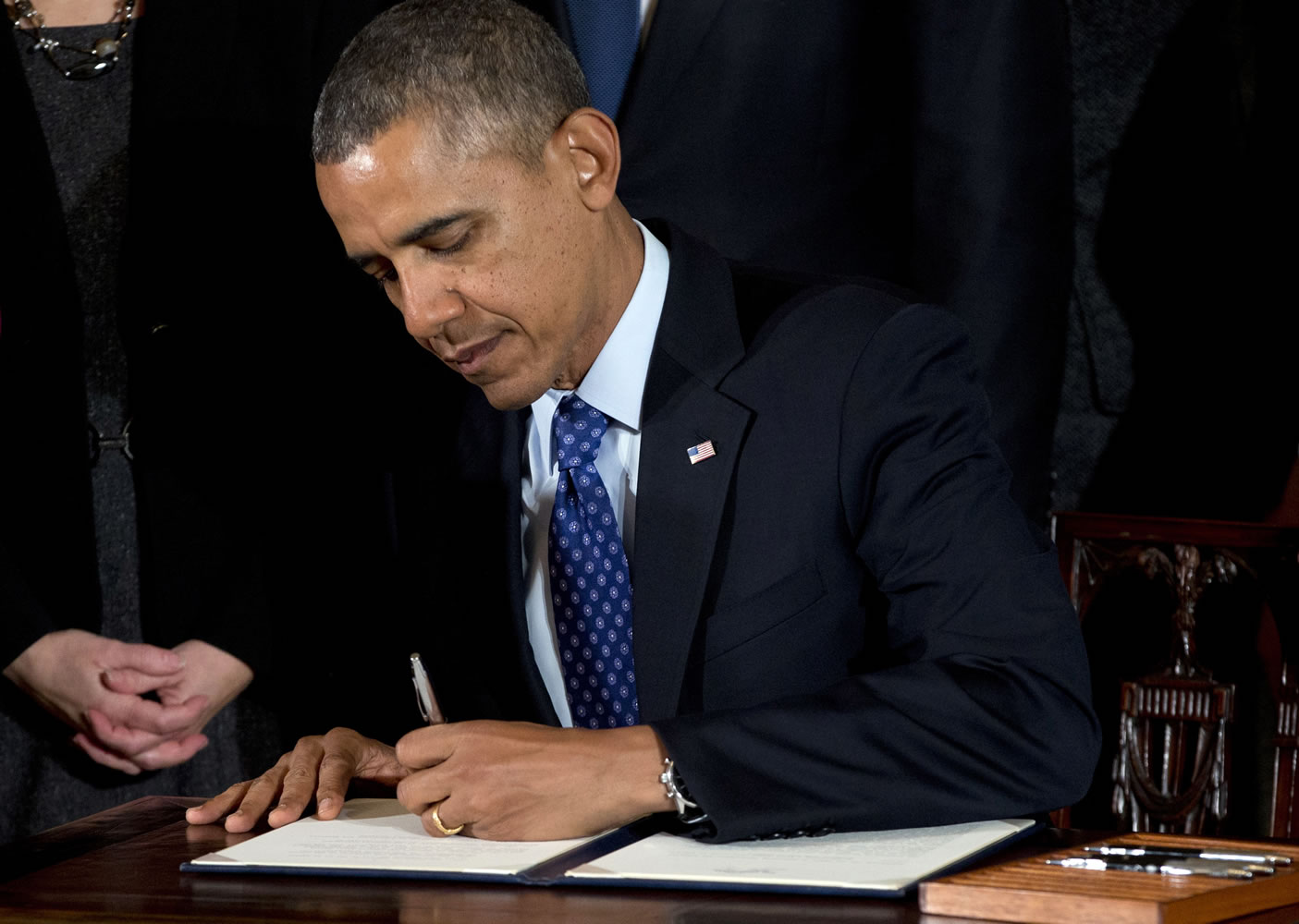 President Barack Obama signs a memorandum in january creating a task force to respond to campus rapes during an event for the Council on Women and Girls in the East Room of the White House in Washington.