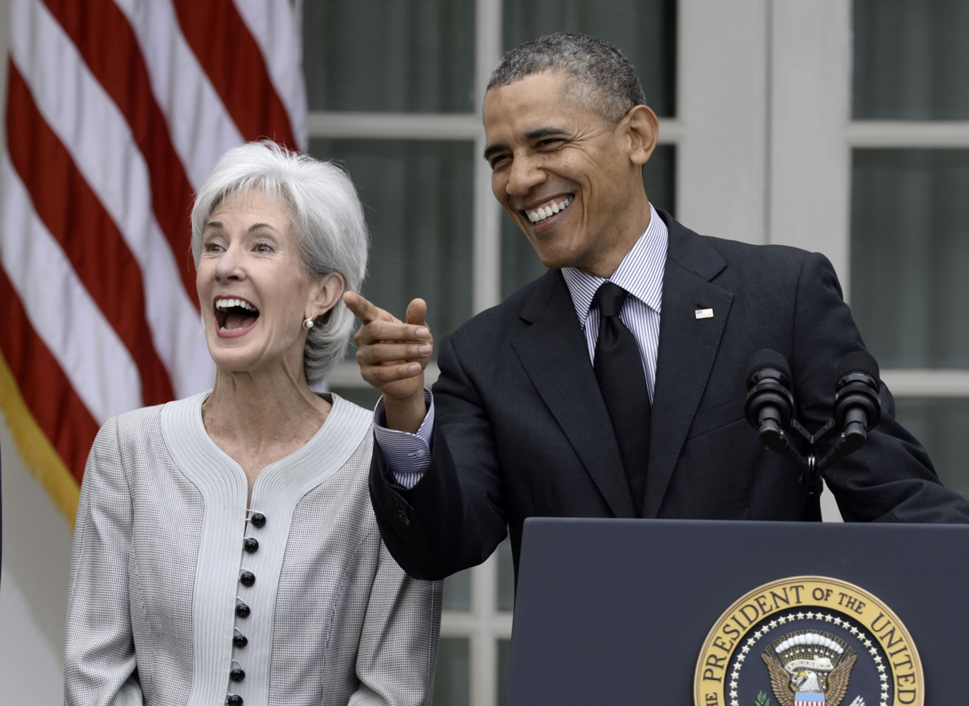 President Barack Obama shares a laugh with outgoing Health and Human Services Secretary Kathleen Sebelius on Friday in the Rose Garden of the White House in Washington to announce he would nominate current Budget director Sylvia Mathews Burwell to replace Sebelius.