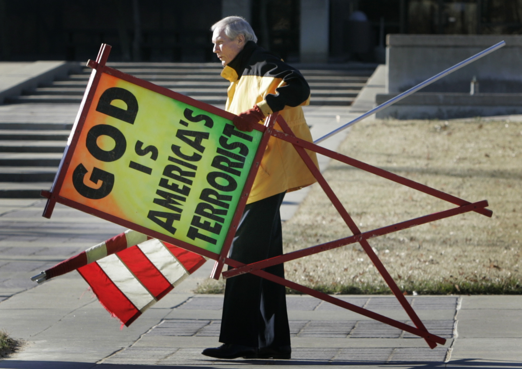 The Rev. Fred Phelps Sr. prepares to protest outside the Kansas Statehouse in Topeka, Kan., on July 1, 2007. Phelps, the founder of the Kansas church known for anti-gay protests and pickets at military funerals, died Thursday.