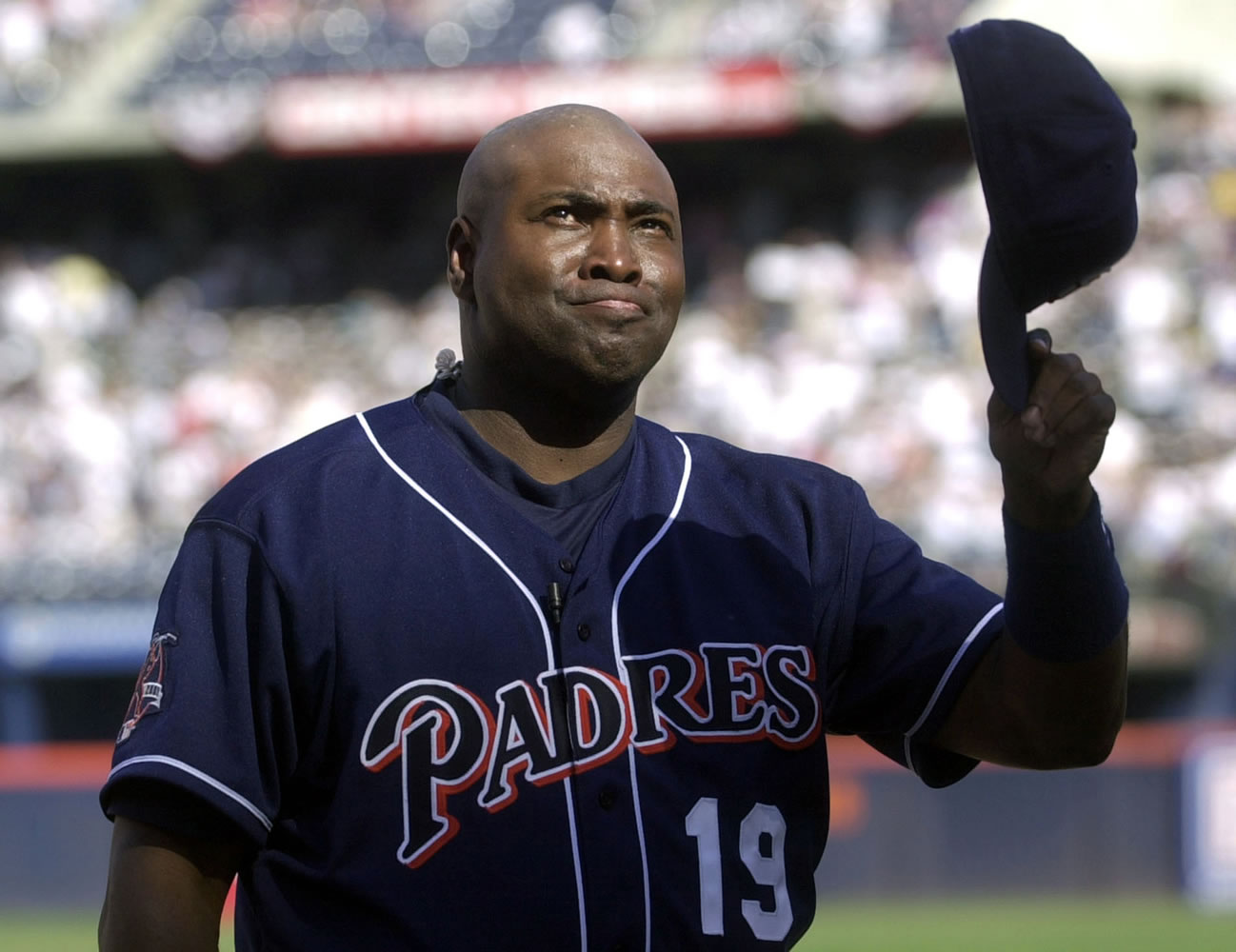 San Diego Padres' Tony Gwynn fights back tears as he acknowledges the standing ovation prior to the Padres' game against the Colorado Rockies, the final game of his career, in San Diego in 2001. The Baseball Hall of Fame said Gwynn died of cancer on Monday.