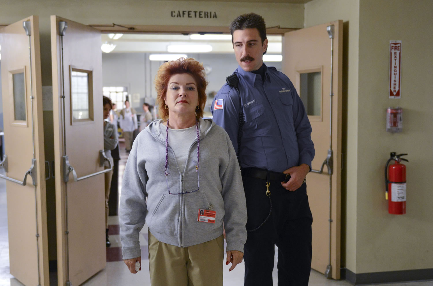 This image released by Netflix shows Kate Mulgrew, left, and Pablo Schreiber in a scene from iOrange is the New Black.i The second season of the prison series will be available on Friday, June 6, on Netflix.
