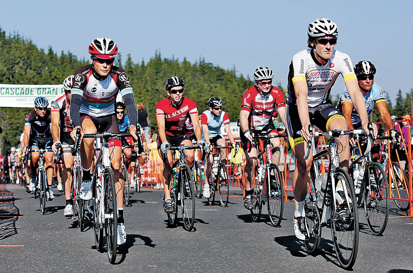 Joe Kline/The (Bend) Bulletin files
Pro cyclist Chris Horner, left, rides with a group of cyclists at the start of the Cascade Gran Fondo on Aug. 4 at Mt. Bachelor west of Bend, Ore. The Central Oregon gran fondo was held for three years but shut down this summer due to scheduling conflicts.