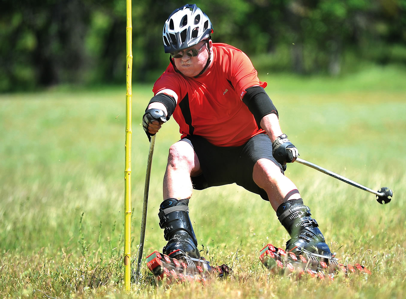 Brian McKay grass-skis down a slalom course that he set up at Emigrant Lake near Ashland, Ore., in May.