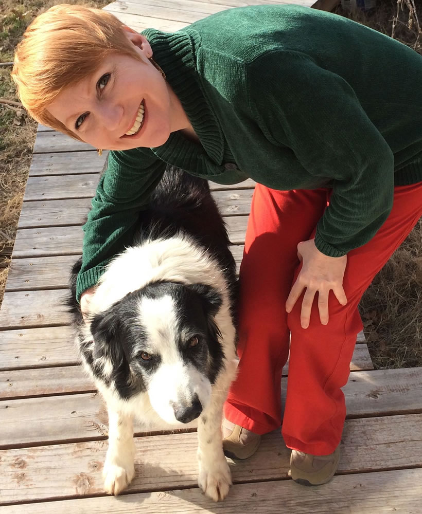 Steve Harris/University of California-San Diego
Emotion researcher Christine Harris, a professor of psychology at the university, poses with her border collie in San Diego. Harris conducted a study on pets and jealousy.